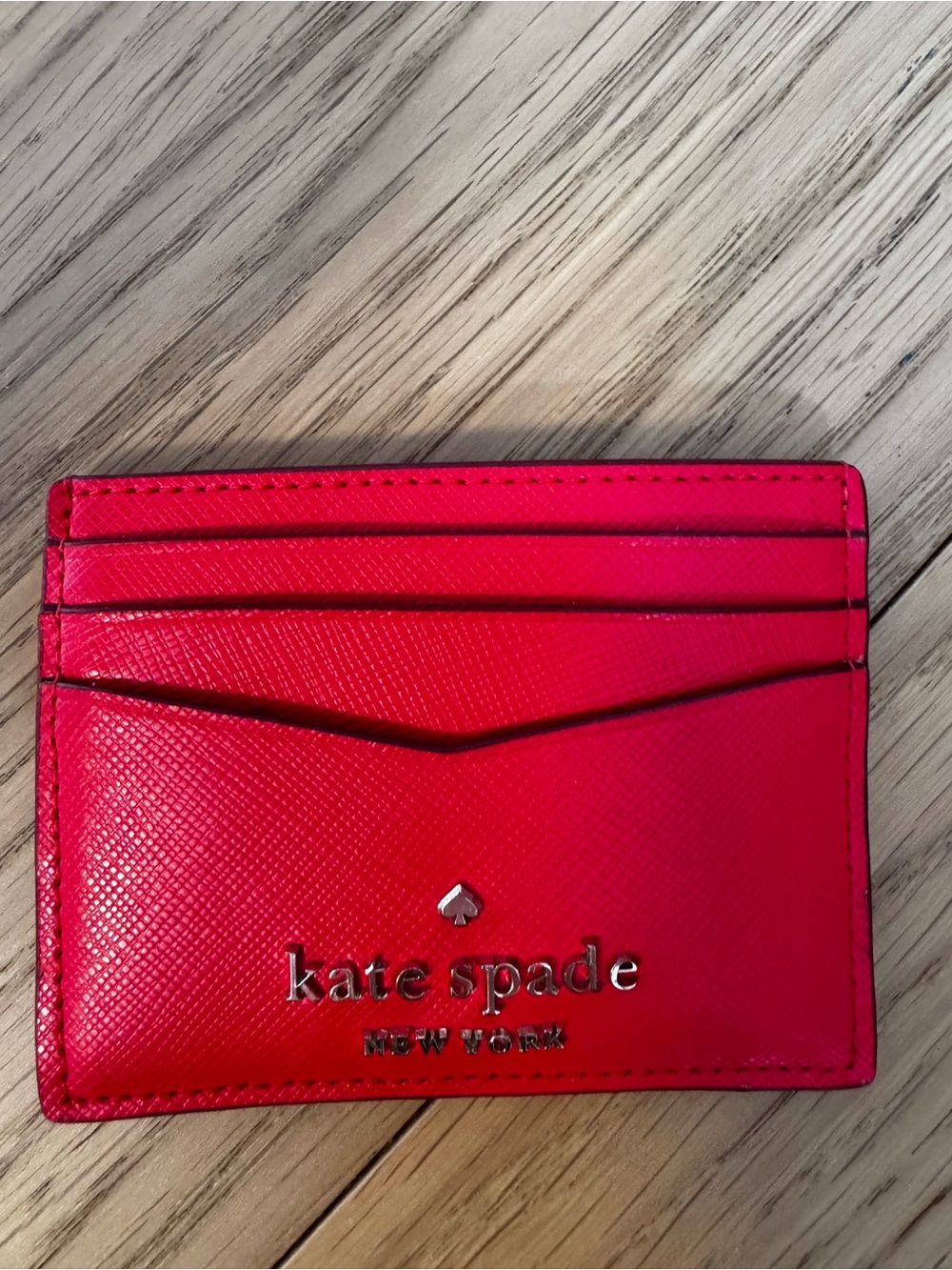 Kate Spade Red cardholder with heart detail